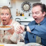 Late for Work Stressed Couple Checking Time in Kitchen.