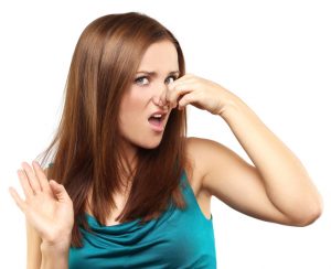 What are the possible reasons for having smelly urine?
