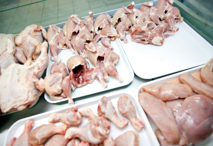 Some uncooked, stuffed chicken p...