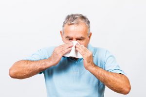 Senior man having flu