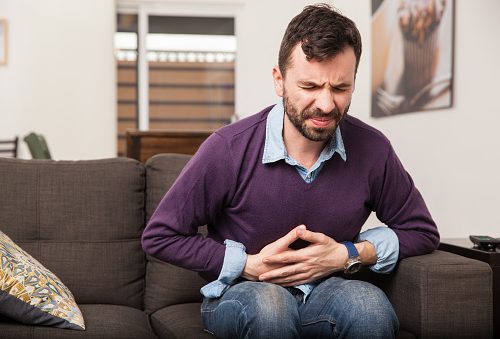Gastritis symptoms including upper abdominal pain, bloating, and nausea