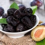 Osteoporosis, bone loss, and fractures due to radiation preventable by consuming dried plums (prunes)