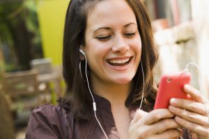 Hearing loss risk increases with earbud usage, listening to loud sounds with earbuds on