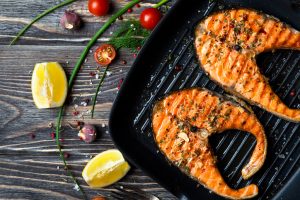 Alzheimer’s disease and memory problems risk may be lowered by eating baked and broiled fish