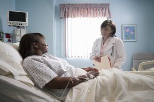 Heart attack patients of low socioeconomic status, especially women, fare worse