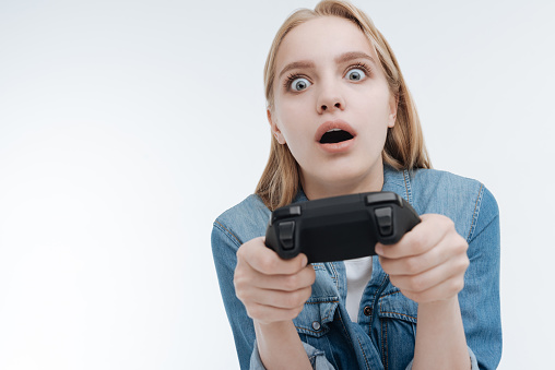 Playing action video games decre...