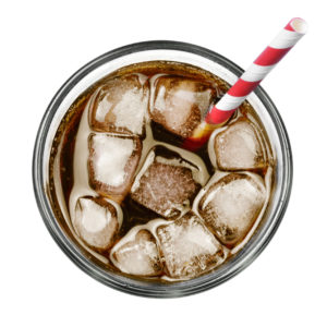 Fresh coke in glass, top view or high angle shot Coca Cola with ice and drinking straw, isolated on white background.