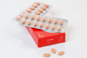 A generic pack of the controversial cholesterol preventative drug Statin - with logos removed