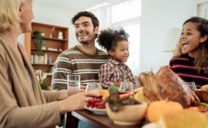 Happy Family Celebrating Thanksgiving Dinner at home .Thanksgiving Celebration tradition concept