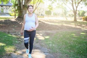 Conceptual of healthy and fitness pregnant woman can do exercise.