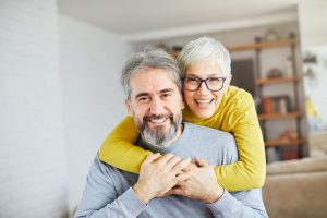 portrait of happy smiling senior couple at home